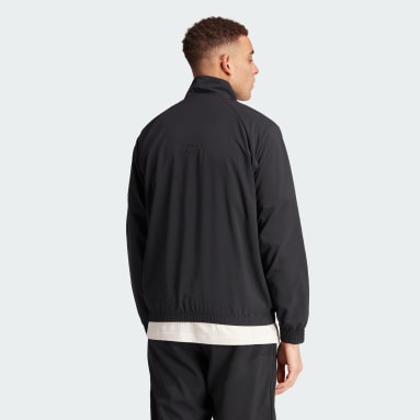 https://assets.adidas.com/images/w_383,h_383,f_auto,q_auto,fl_lossy,c_fill,g_auto/934e0b34a7a8494b8d3d26a10c6eb89b_9366/adidas-embroidery-woven-1-2-zip-top.jpg