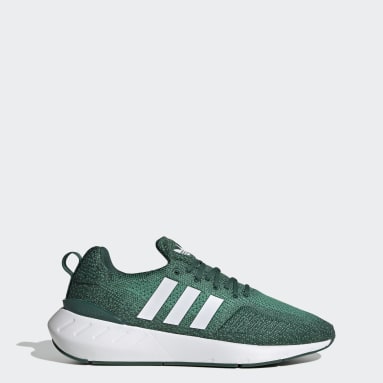 green adidas suede trainers