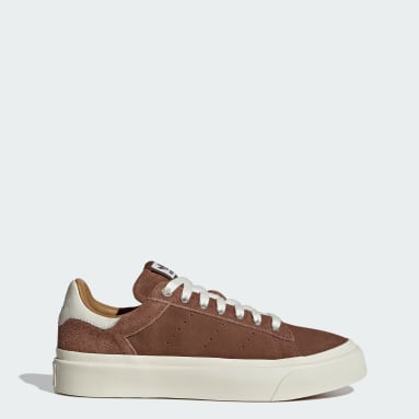 Adidas originals stan smith leather trainers in white m2325 hot sale