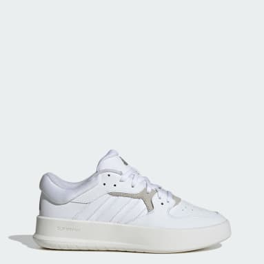 Adidas black and gold tennis shoes top