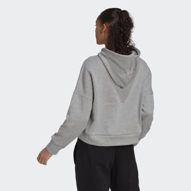Polera con Capucha Future Icons Badge of Sport Plomo Mujer Sportswear