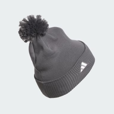 Bonnet à pompom et revers de couleur unie