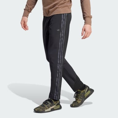 Muži Originals černá Kalhoty adidas Adventure Slim