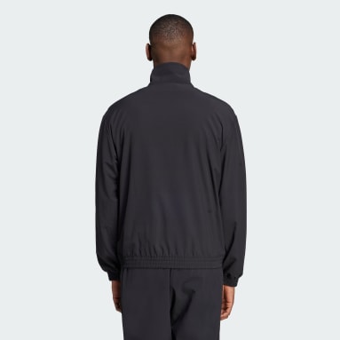 House of Tiro Woven Track Top