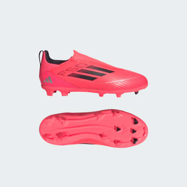 Pink messi cleats sales