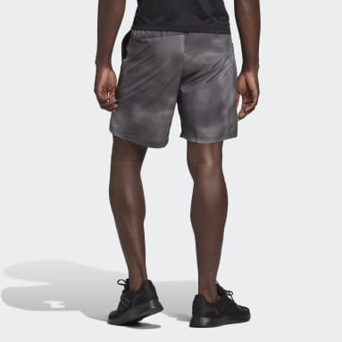 Muži Běh šedá Šortky Own the Run Colorblock