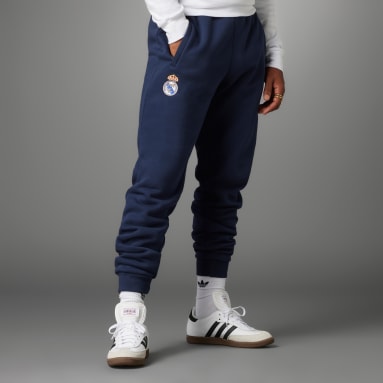 Muži Futbal modrá Tepláky Real Madrid Essentials Trefoil