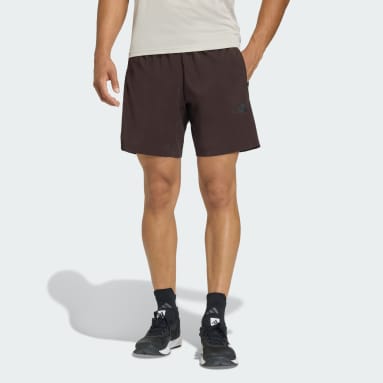 WORKOUT ESSENTIALS BASE WOVEN SHORT