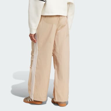 กางเกงขายาวผ้าทอทรงพาราชูต 3-Stripes