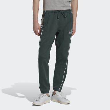 Muži Originals zelená Sportovní kalhoty adidas Rekive