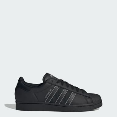 Adidas negras hombre shop
