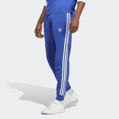 Muži Originals modrá Tepláky Adicolor Classics 3-Stripes