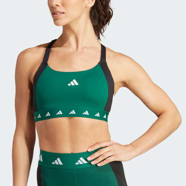 A woman in a neon green sports bra top Image & Design ID 0000380294 