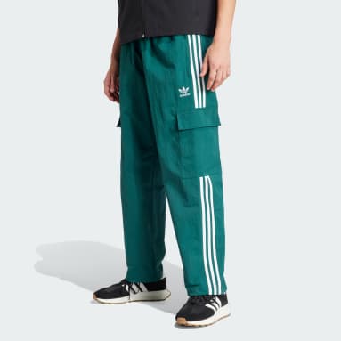 adidas Originals CLASSICS TRACK PANT LOOSE - Tracksuit bottoms - collegiate  green/true pink/green 