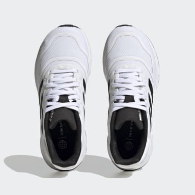 Zapatillas running niño blancas 2025