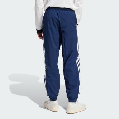 adidas Originals resort wide leg pants in off white with red binding detail