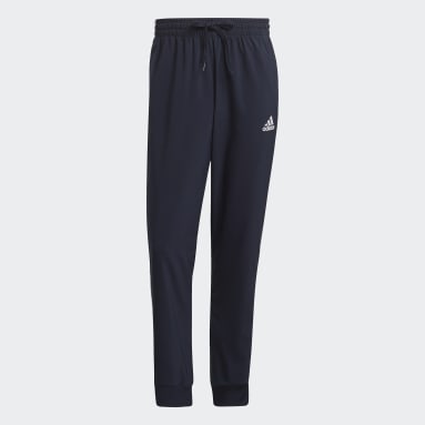 Pants AEROREADY Essentials 3 Franjas Pierna Cónica Puño Ajustado Tejidos Azul Hombre essentials