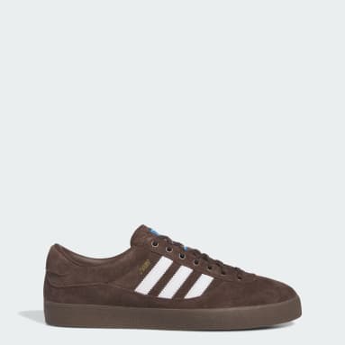 Tenis negros deals con suela cafe
