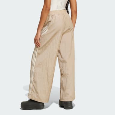 Adidas tan track pants top