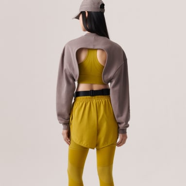 ผู้หญิง adidas by Stella McCartney สีเขียว กางเกงเทรนนิงขาสั้นดีไซน์ทูอินวัน adidas by Stella McCartney TruePurpose
