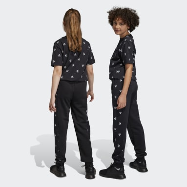 Pantalón Estampado Brand Love Side Insert Negro Niño Sportswear