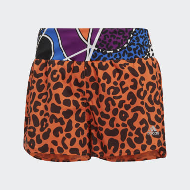 Shorts x Rich Mnisi Naranja Mujer Running