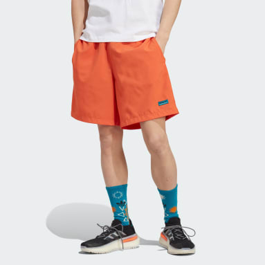 ผู้ชาย Originals สีส้ม กางเกงขาสั้นผ้าทอ adidas Adventure