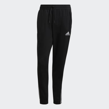 Muži Sportswear černá Kalhoty Essentials French Terry Tapered 3-Stripes