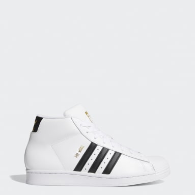 women's high top shell toe adidas