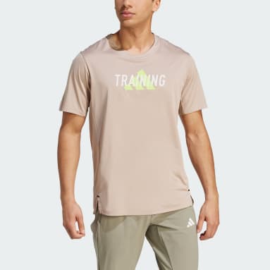 Polo Designed for Movement Graphic Workout Beige Hombre Training