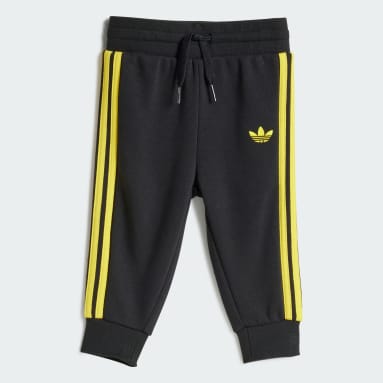 ชุดเสื้อคอกลมและกางเกง adidas Originals x Smiley World