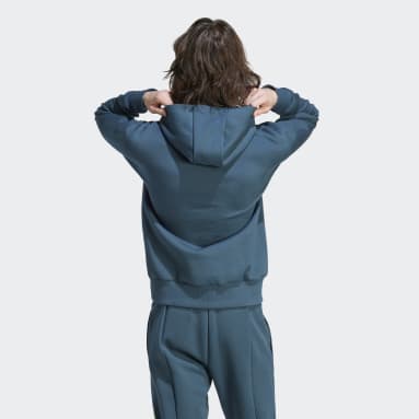 Polera con Capucha Future Icons Badge of Sport Turquesa Hombre Sportswear