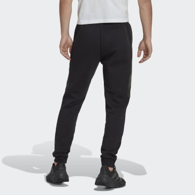 Muži Sportswear černá Kalhoty Essentials Camo Print Fleece