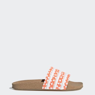 dorp Skalk schakelaar Oranje slippers | adidas NL