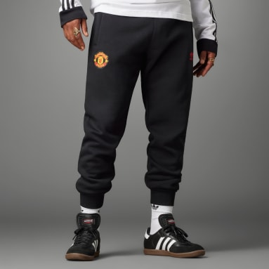 Herr Fotboll Svart Manchester United Essentials Trefoil Byxor