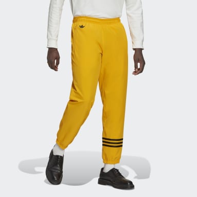 Muži Originals žlutá Sportovní kalhoty Adicolor Neuclassics