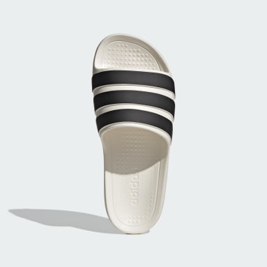 Price of adidas slippers sales
