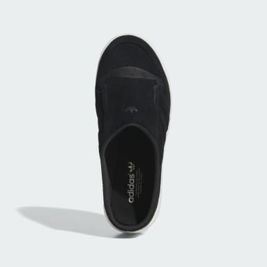 Black adidas slip on deals