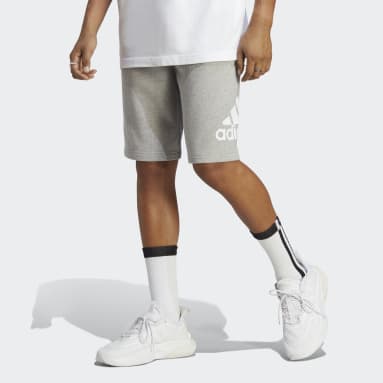 ผู้ชาย Sportswear สีเทา กางเกงขาสั้นผ้าเฟรนช์เทอร์รีย์ Essentials Big Logo