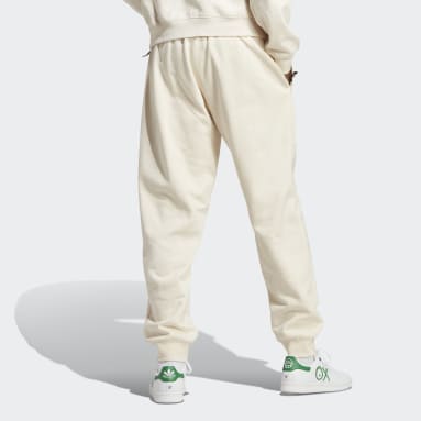 Muži Originals béžová Tepláky adidas Adventure
