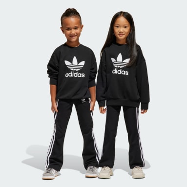 Conjunto de buzo de corte holgado con cuello redondo y calzas acampanadas para niños