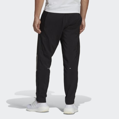 Pantalón Own the Run Woven Astro Negro Hombre Running