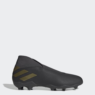 gold laceless football boots