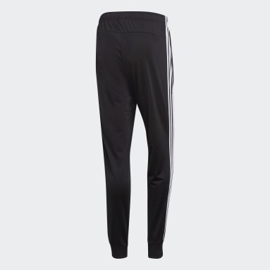 Pants Essentials Tapered Tricot 3 Franjas Negro Hombre Diseño Deportivo