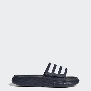 adidas slippers under 2 Cinosural International School