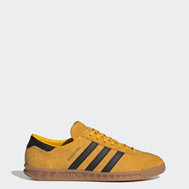 yellow adidas trainers