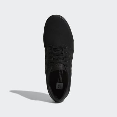 ladies plain black trainers