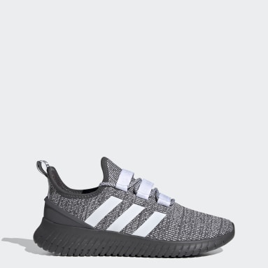 grey and white adidas sneakers