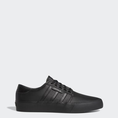 all black adidas skate shoes