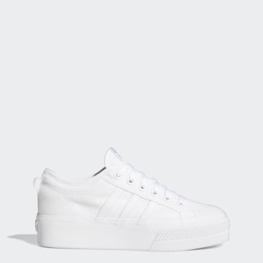 white adidas platform trainers